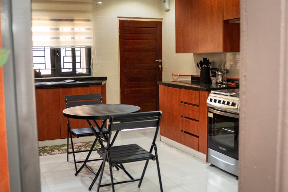 Kitchen or kitchenette, oven, stove, toaster