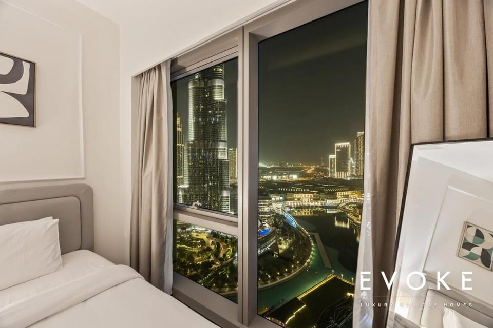 Grande 2BR Balcony Burj & Fountain Views by Evoke Apartment in Dubai
