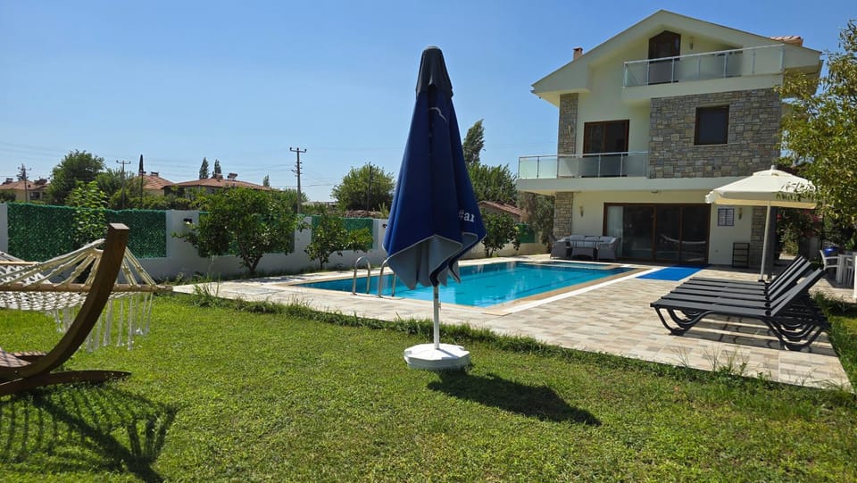 Property building, Patio, Day, Garden, Garden view, Pool view, Swimming pool, sunbed