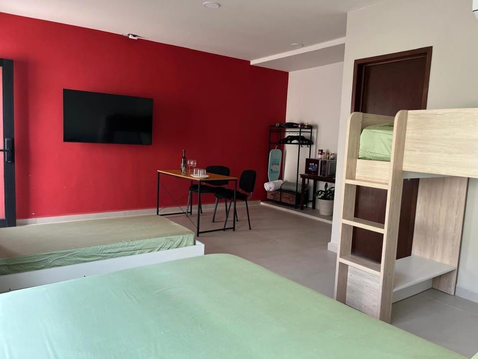 Bed, TV and multimedia, Seating area, wardrobe