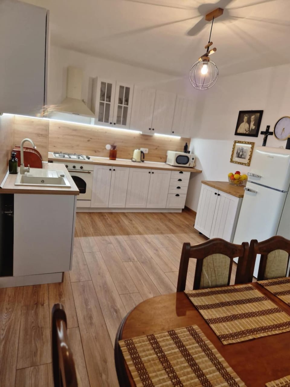 Kitchen or kitchenette, dishwasher, oven, stove