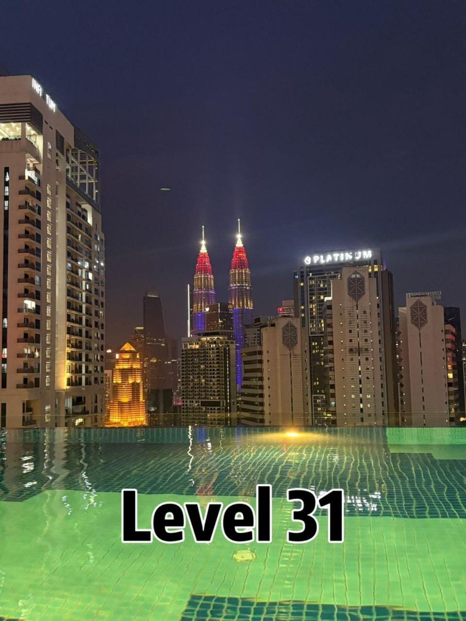 Property building, Night, View (from property/room), City view, Swimming pool