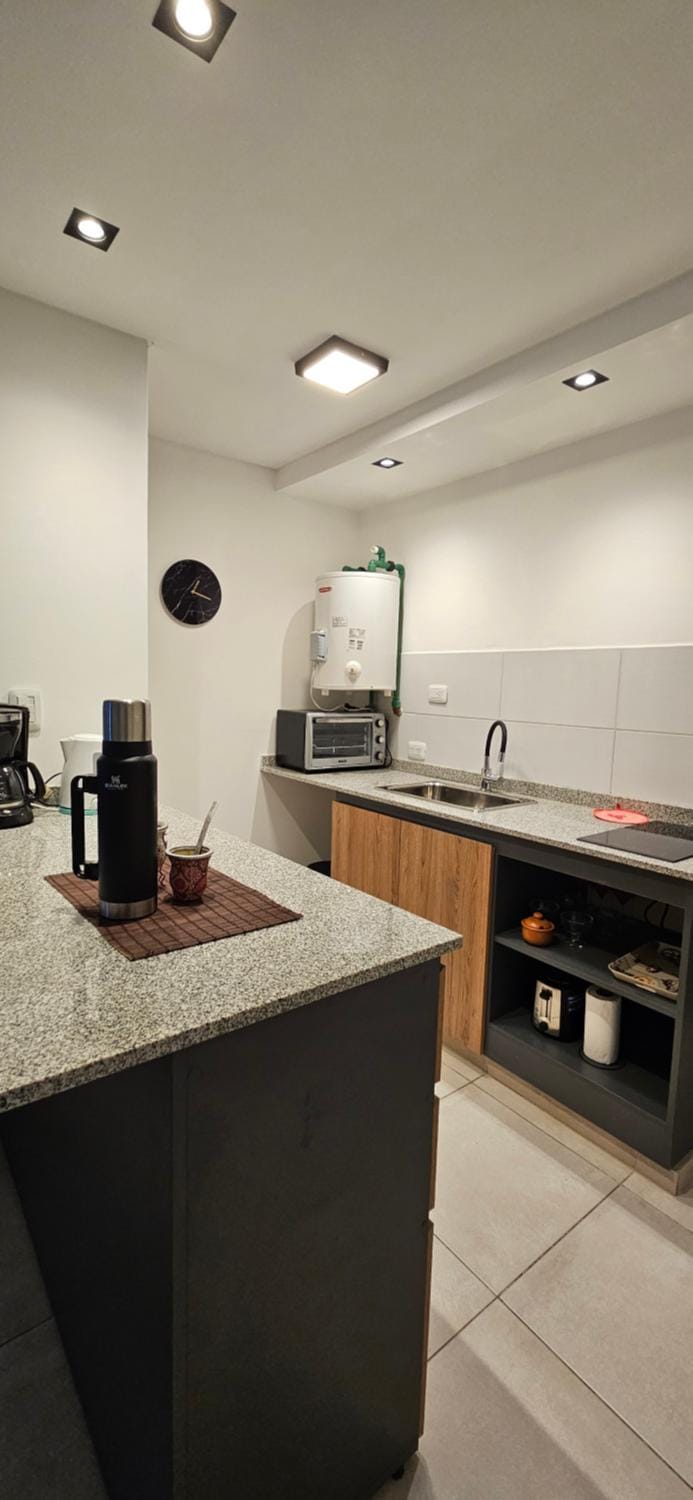 Kitchen or kitchenette, stove, toaster