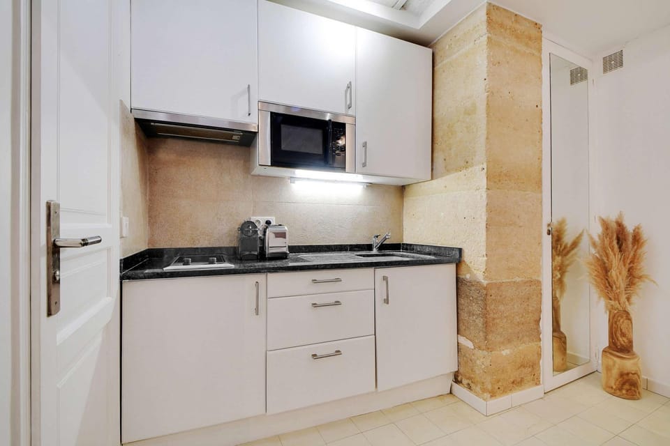 Kitchen or kitchenette, stove