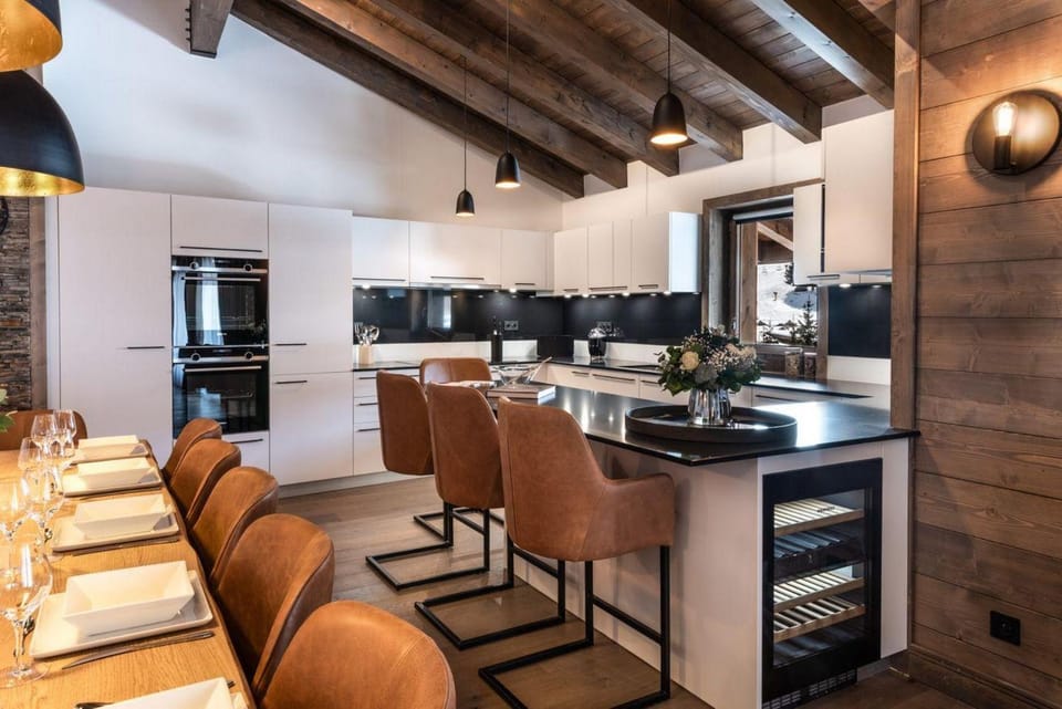 Kitchen or kitchenette, dishwasher, oven, stove