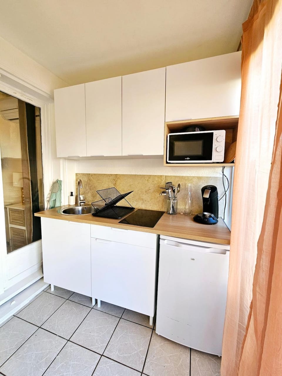 Kitchen or kitchenette, stove, toaster