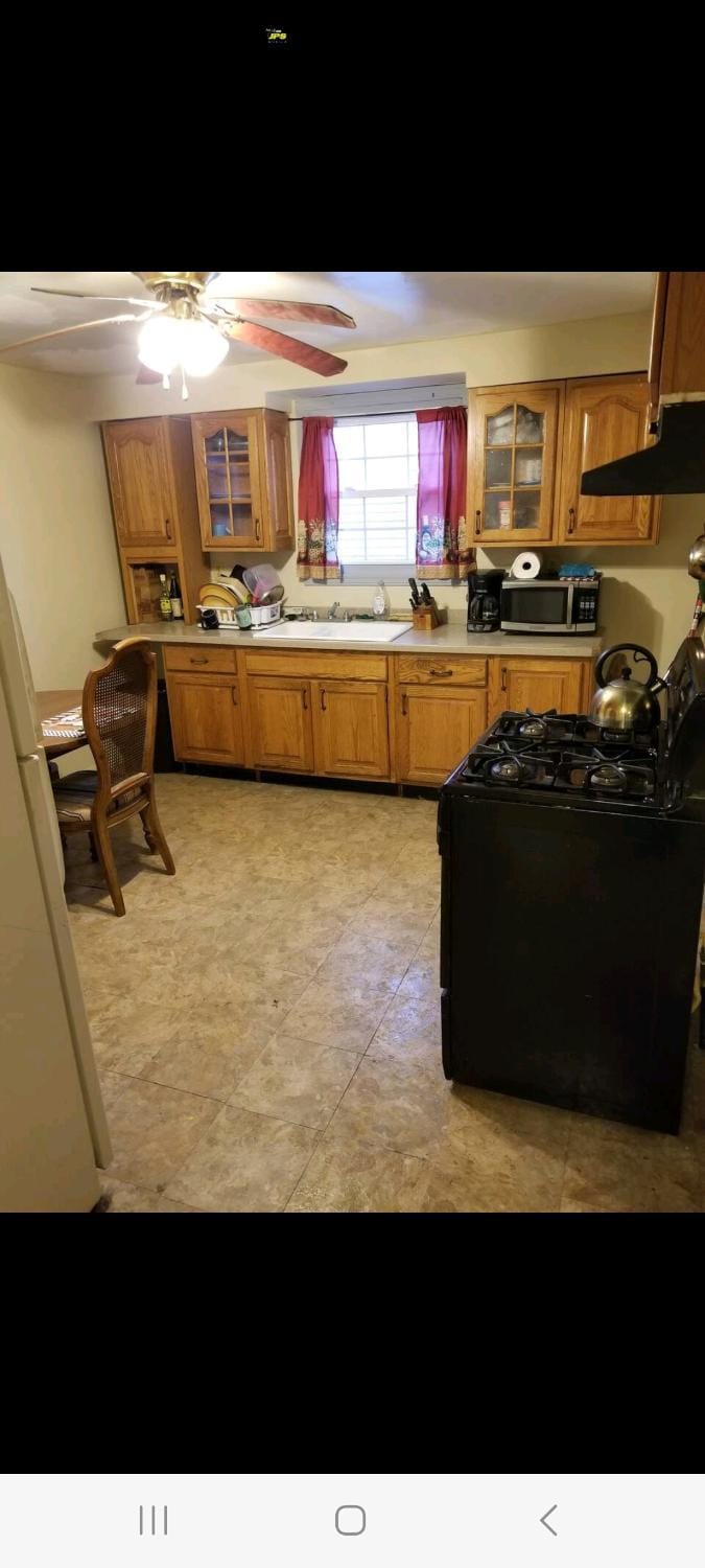 Kitchen or kitchenette, stove