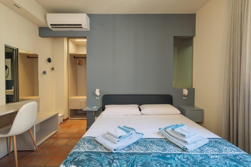 Bed, Photo of the whole room, Bedroom, towels, air conditioner