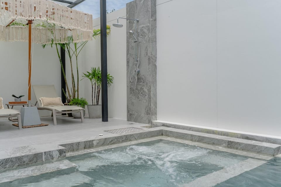 Shower, Patio, Swimming pool, sunbed