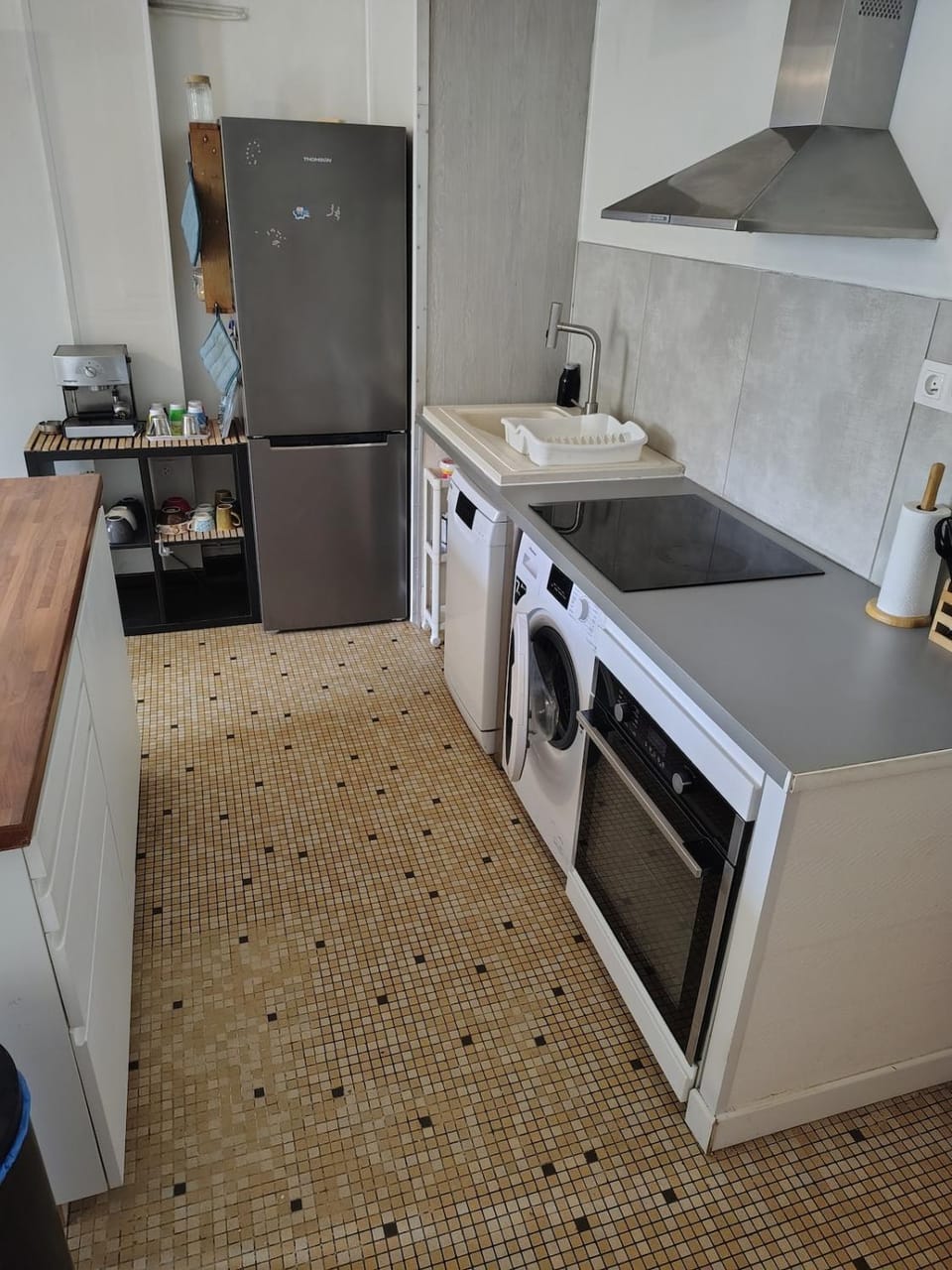 Kitchen or kitchenette, dishwasher, oven, stove, toaster