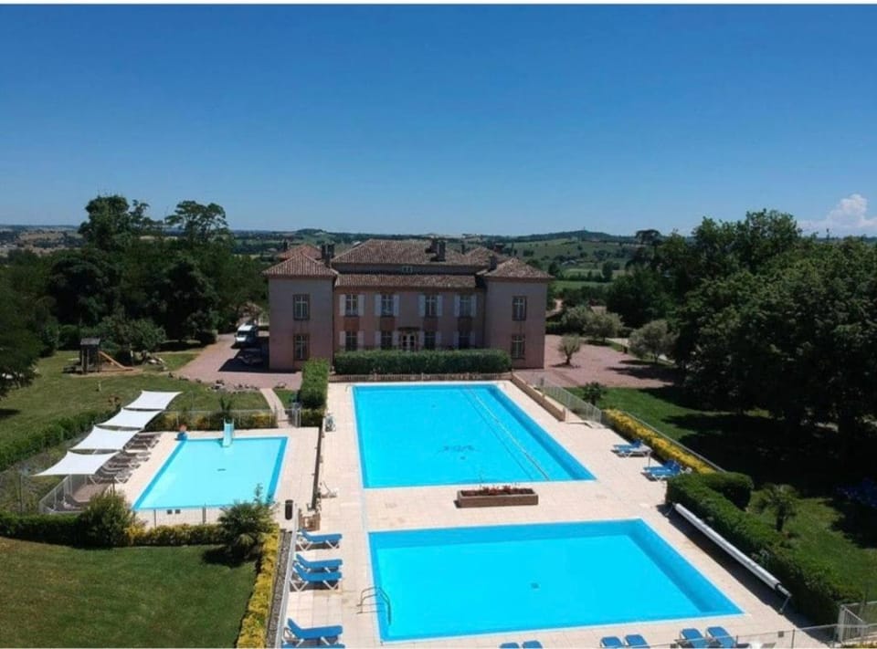 Property building, Natural landscape, Pool view, Swimming pool, sunbed
