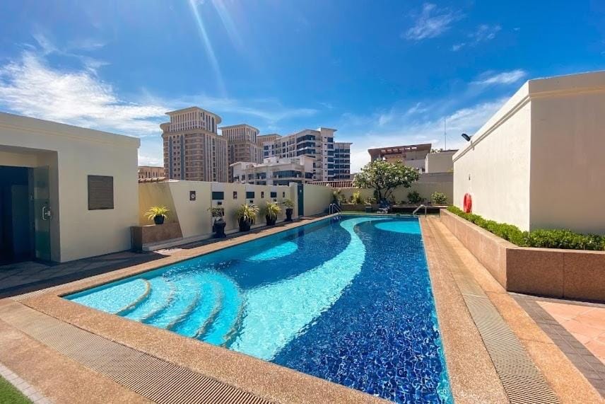 Property building, Pool view, Swimming pool, sunbed