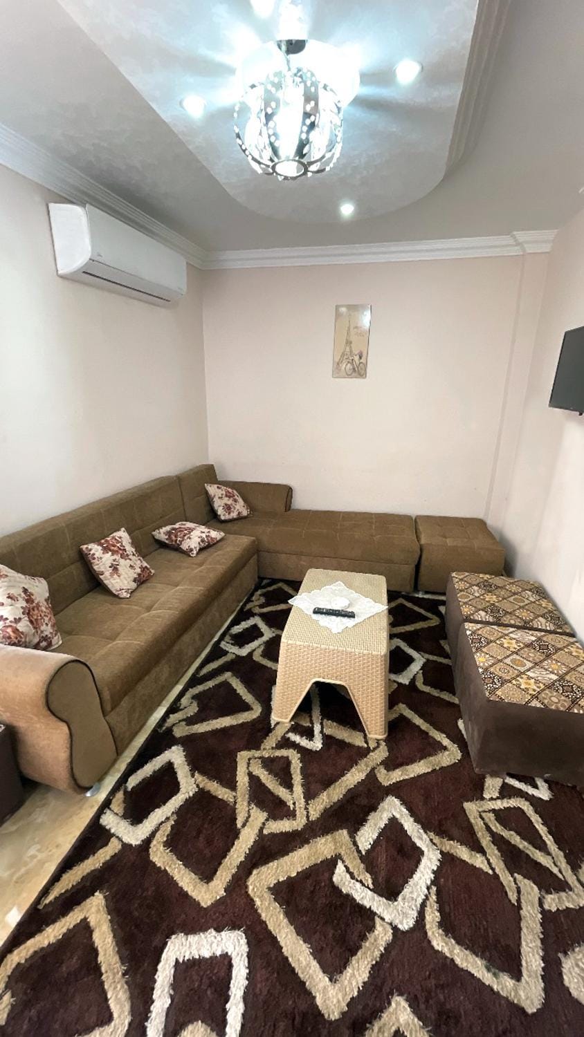 Communal lounge/ TV room, Living room, Seating area, air conditioner