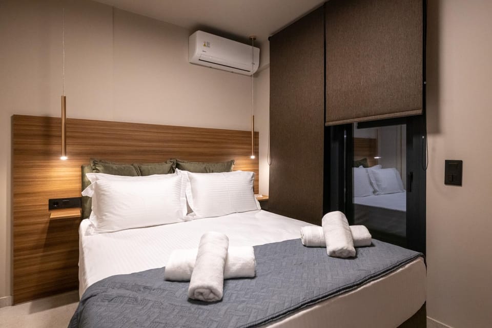 Bed, Photo of the whole room, Bedroom, towels, air conditioner