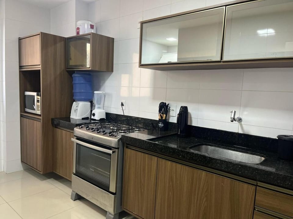 Kitchen or kitchenette, oven, stove