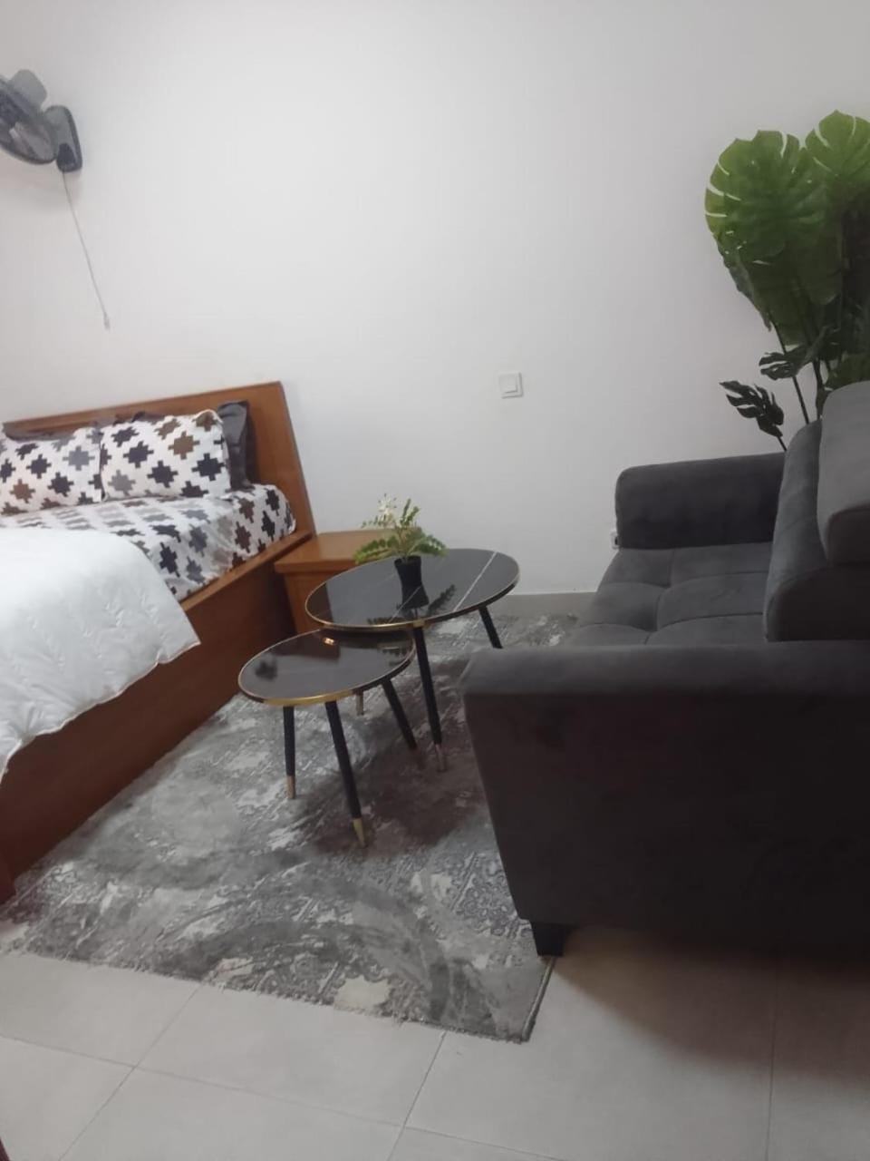 Bed, Living room, Seating area, Bedroom