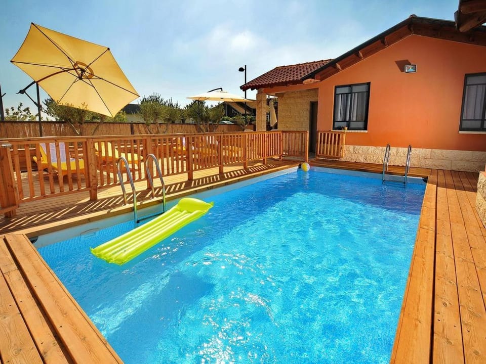 Patio, Day, Pool view, Swimming pool, sunbed