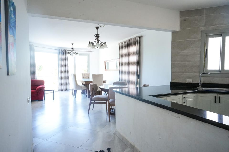Spacious 4BR Einbay Chalet Overlooking Lake & Golf Apartment in Egypt