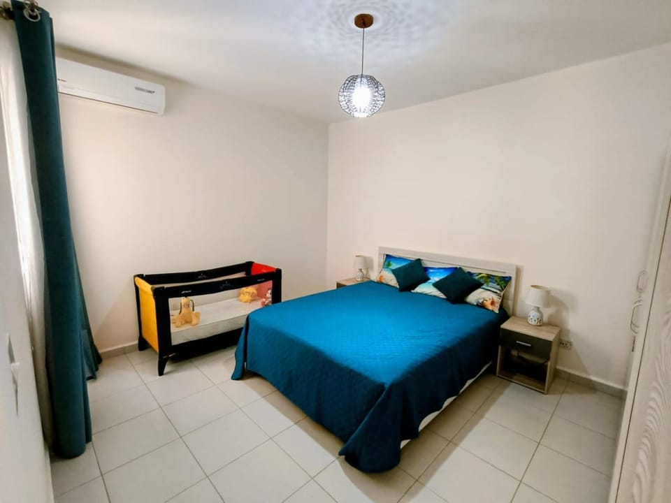 Photo of the whole room, Bedroom, cot, air conditioner