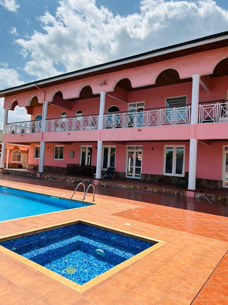 Property building, Patio, Pool view, Swimming pool, sunbed