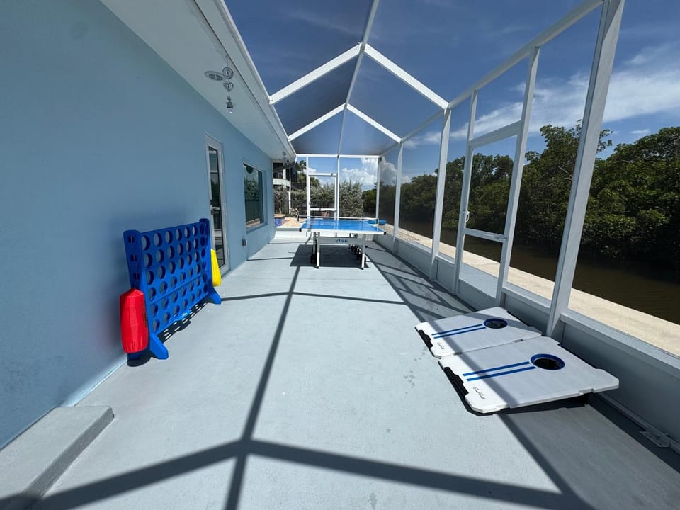 Sun, Fun & Serenity with Pool, Spa, Games & Gulf Access - Blue Peace House in Estero Island