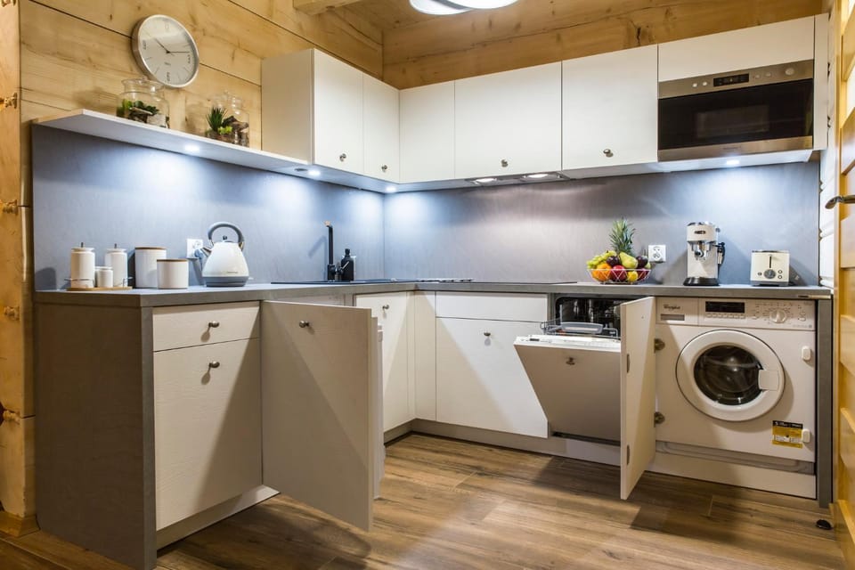Kitchen or kitchenette, dishwasher, stove, toaster, washing machine