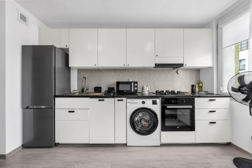 Coffee/tea facilities, Kitchen or kitchenette, dishwasher, oven, stove, washing machine