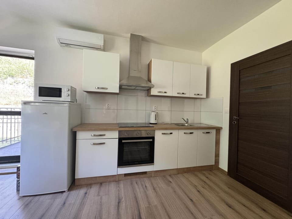 Kitchen or kitchenette, stove