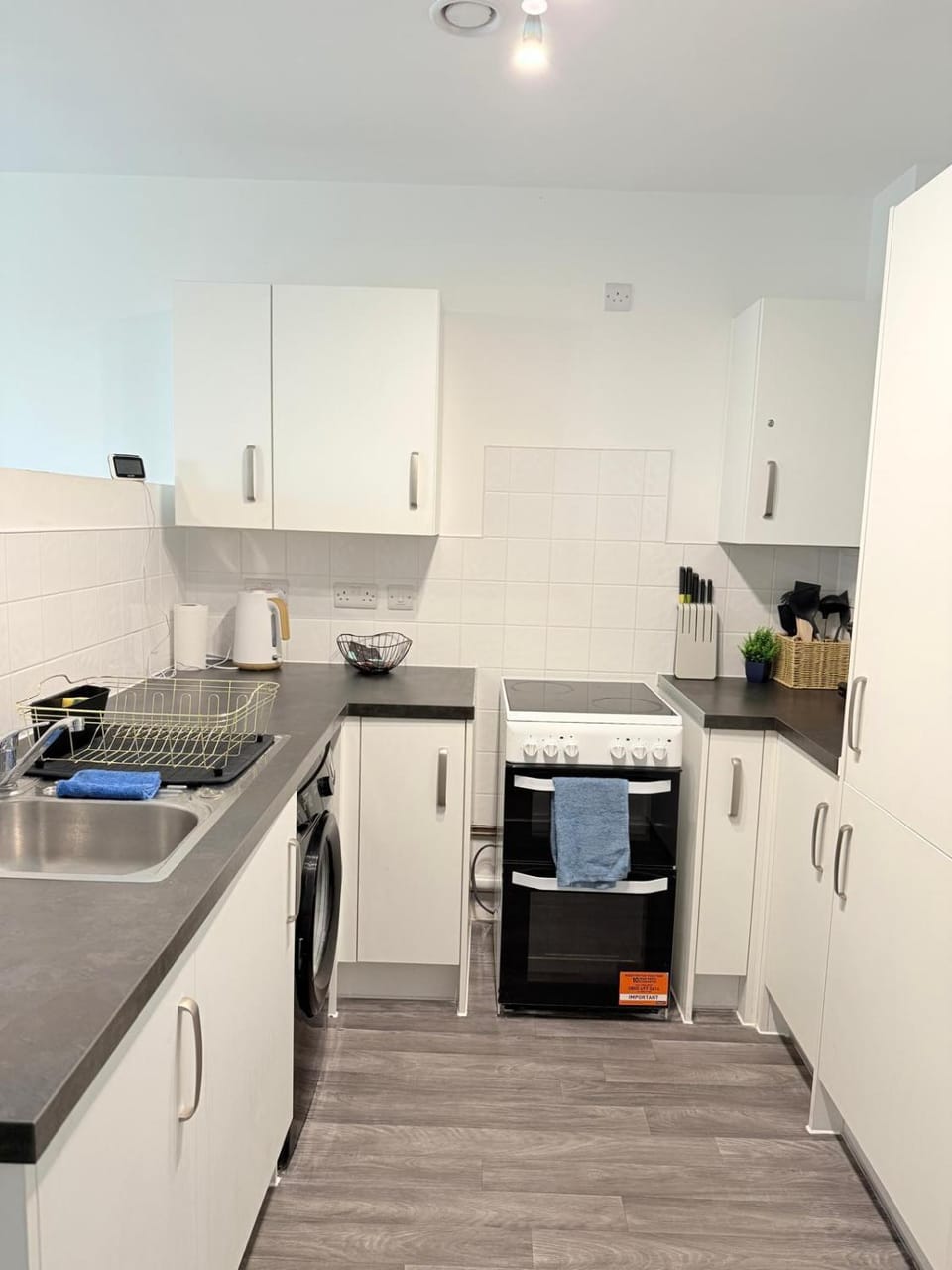 Kitchen or kitchenette, oven, stove, toaster