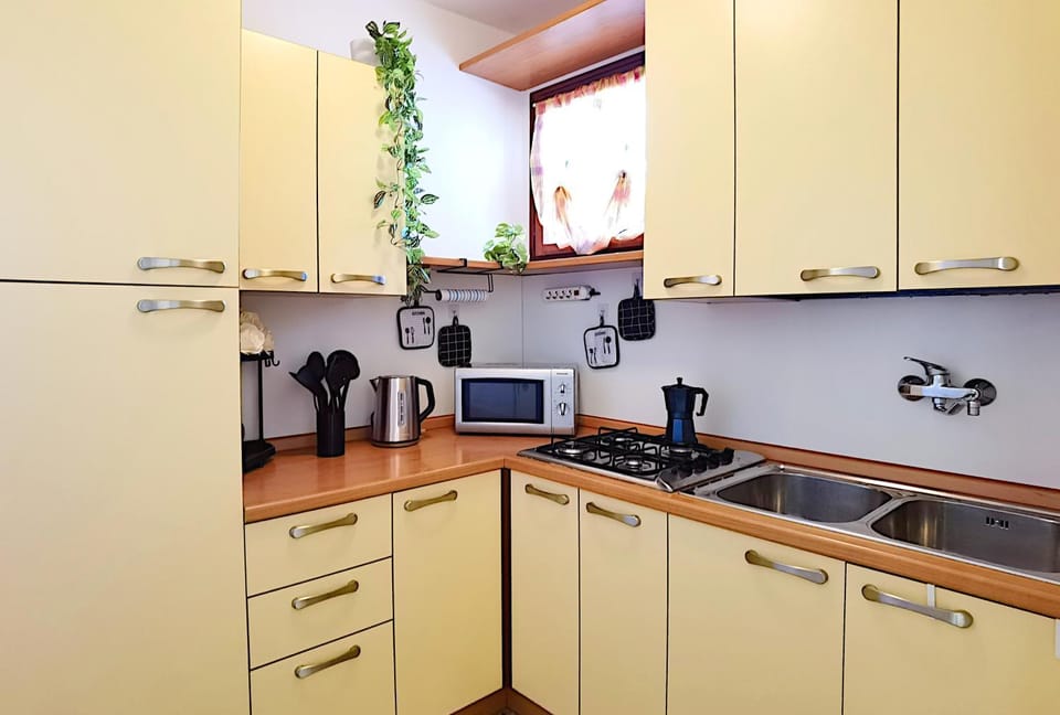 Kitchen or kitchenette, stove