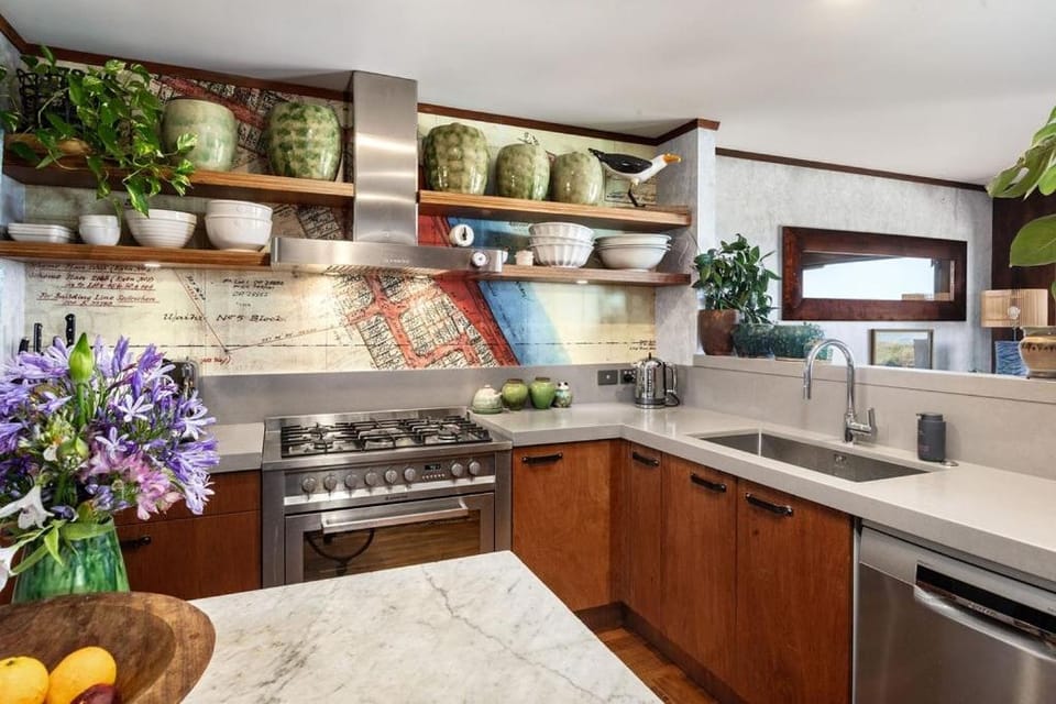 Kitchen or kitchenette, dishwasher, oven, stove
