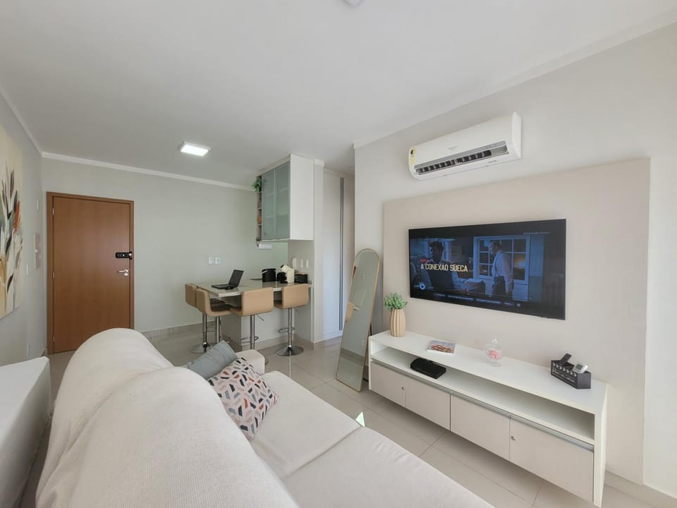 Communal lounge/ TV room, TV and multimedia, Kitchen or kitchenette, Living room, Seating area, air conditioner