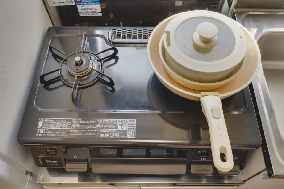 Kitchen or kitchenette, stove