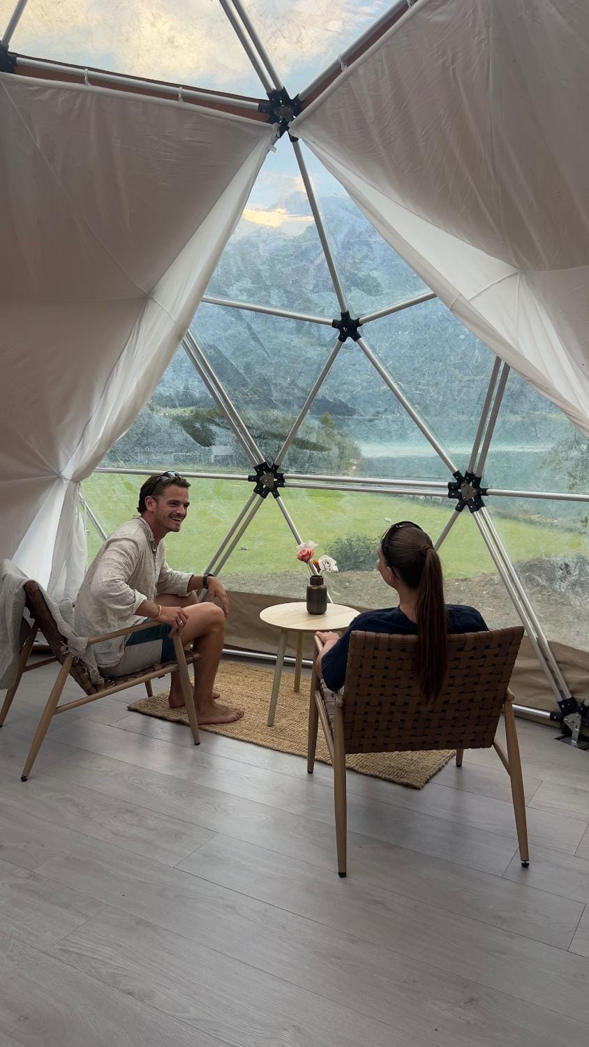 People, Natural landscape, View (from property/room), Living room, Seating area, Mountain view