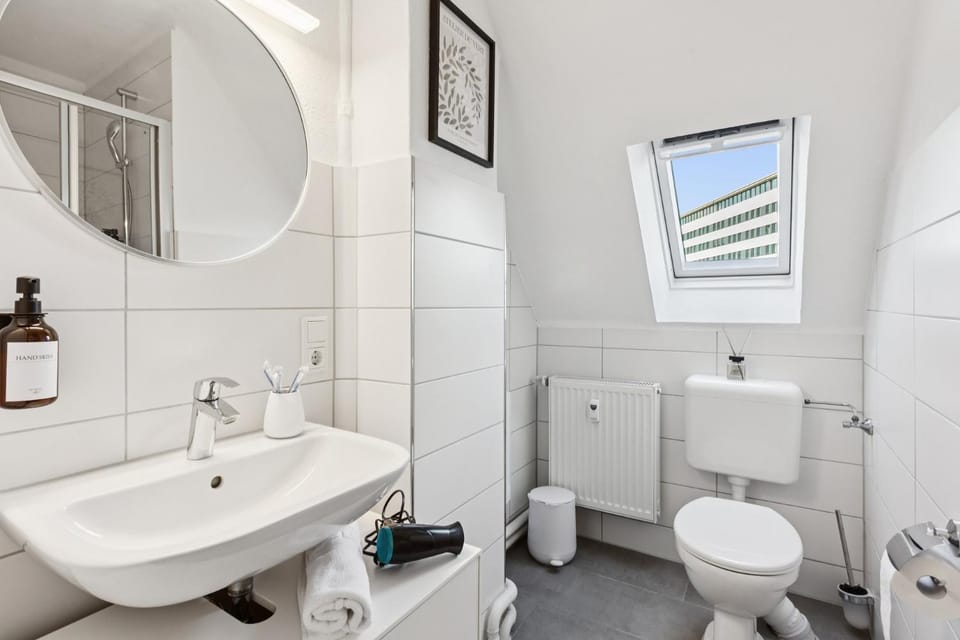 Shower, Toilet, Bathroom, hair dryier, towels