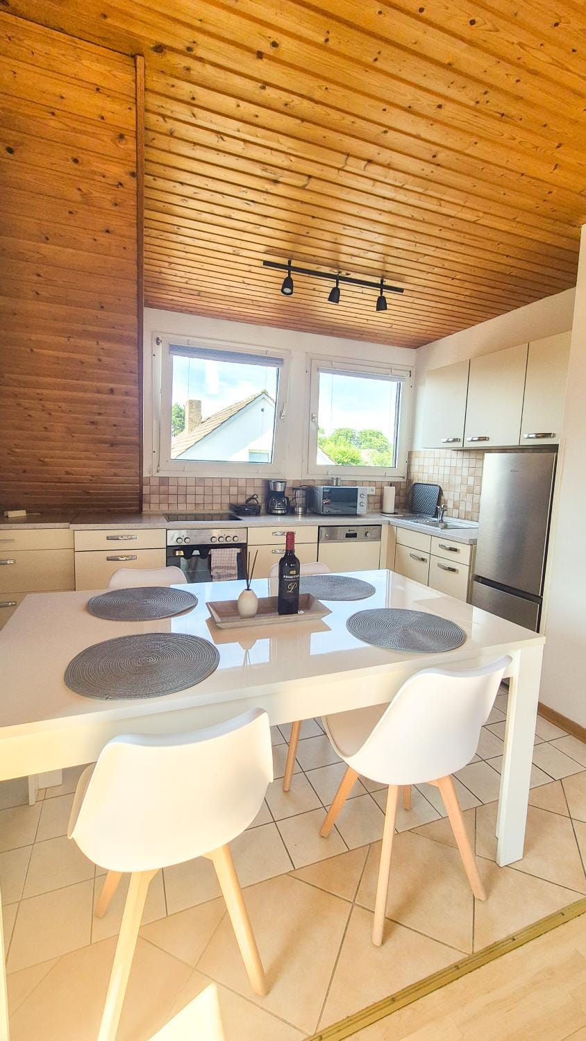 Dining area, dishwasher, oven, kitchen