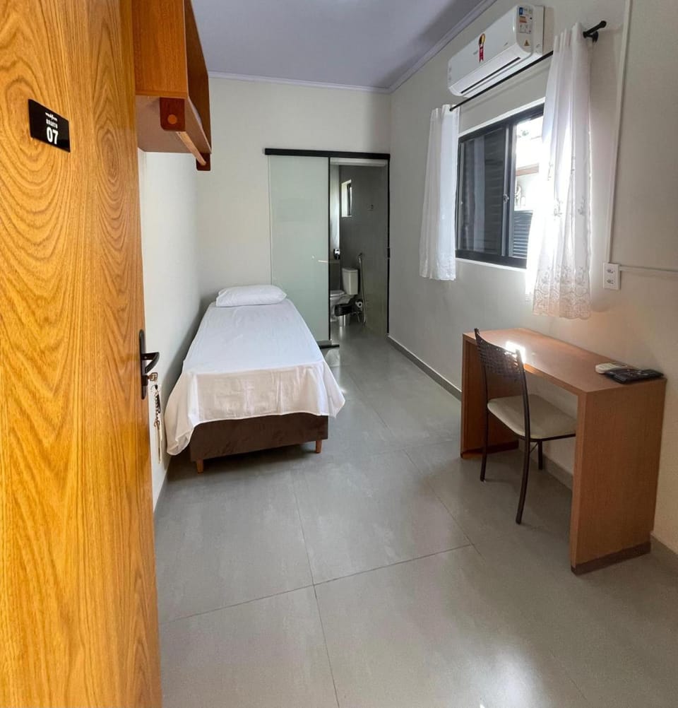 Bed, air conditioner