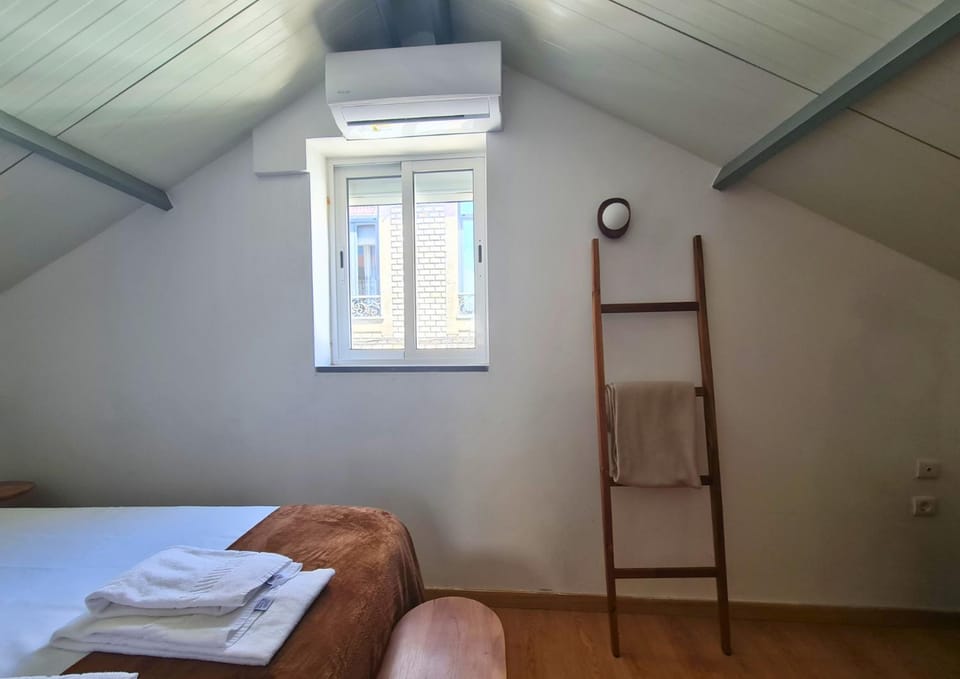 Bed, Photo of the whole room, Bedroom, towels, air conditioner