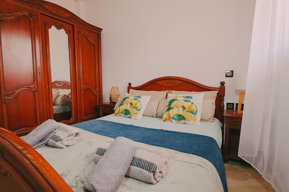 Bed, wardrobe
