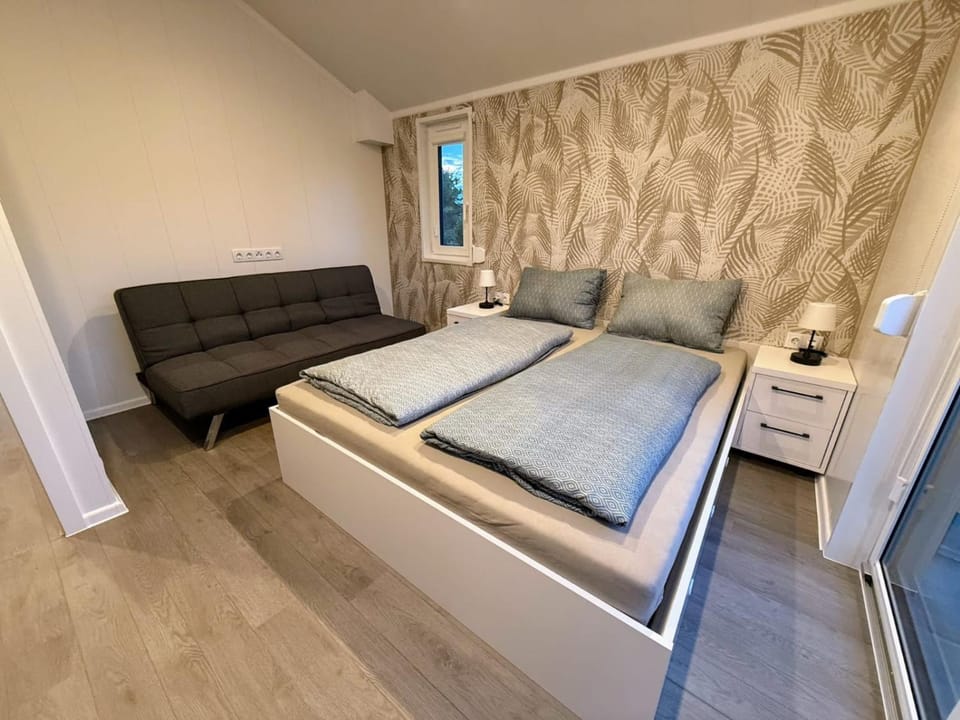 Bed, Seating area, Bedroom