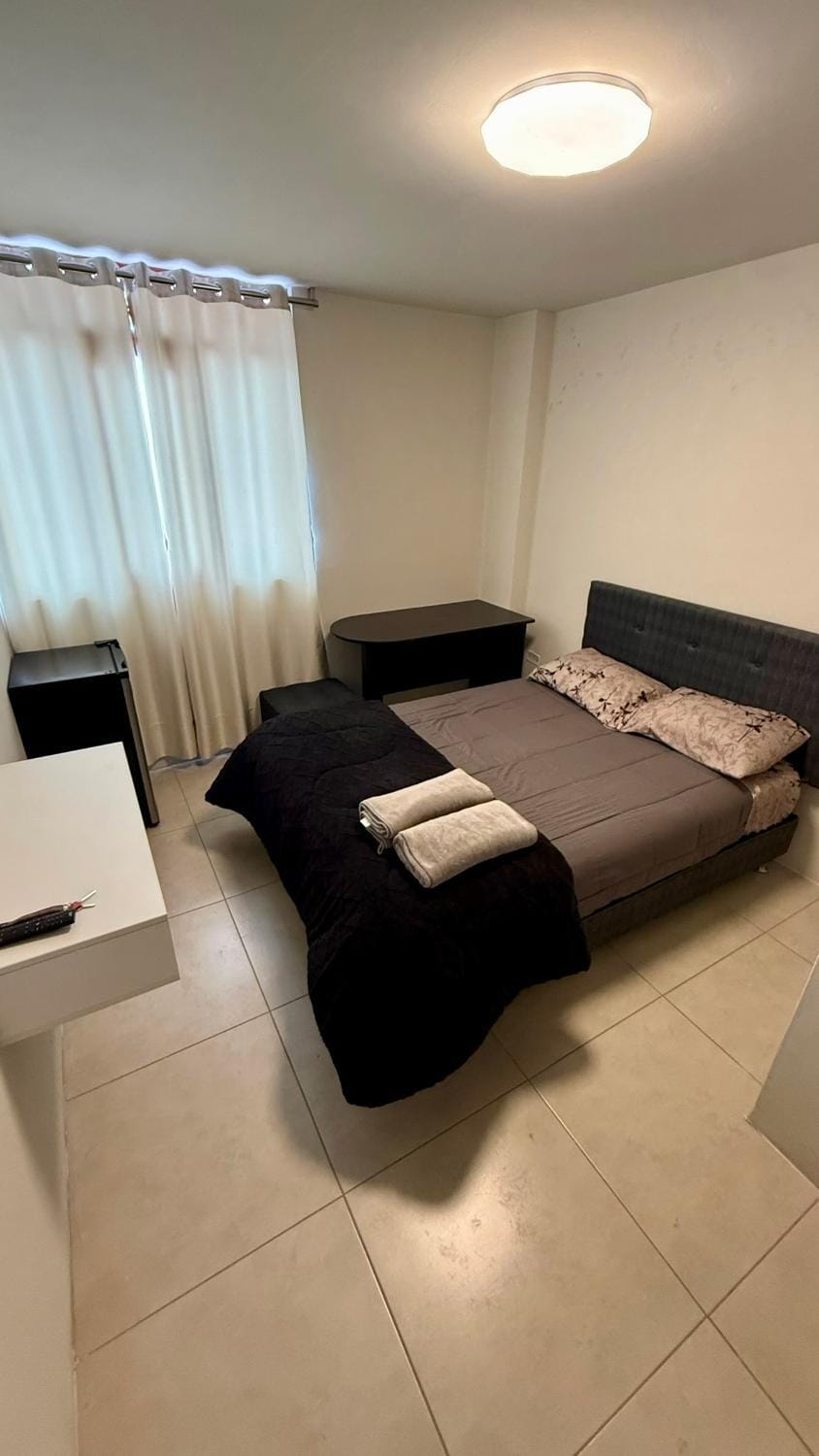 Property building, Bed, towels, wardrobe
