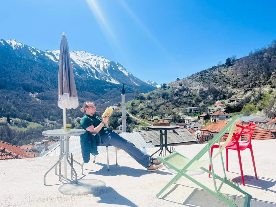 Patio, Nearby landmark, Spring, Day, People, Natural landscape, Dining area, Guests, Mountain view