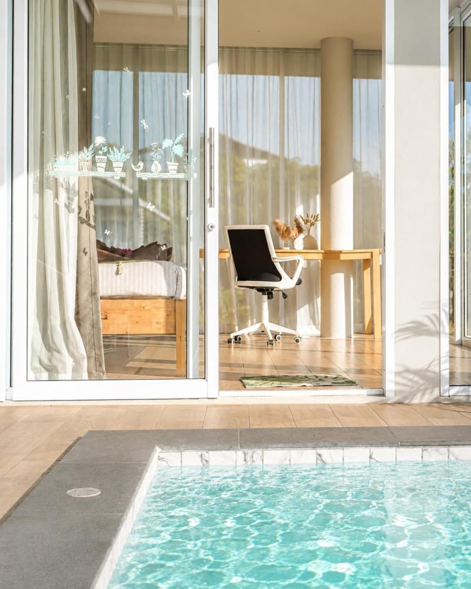 Patio, Day, Natural landscape, Pool view, sunbed