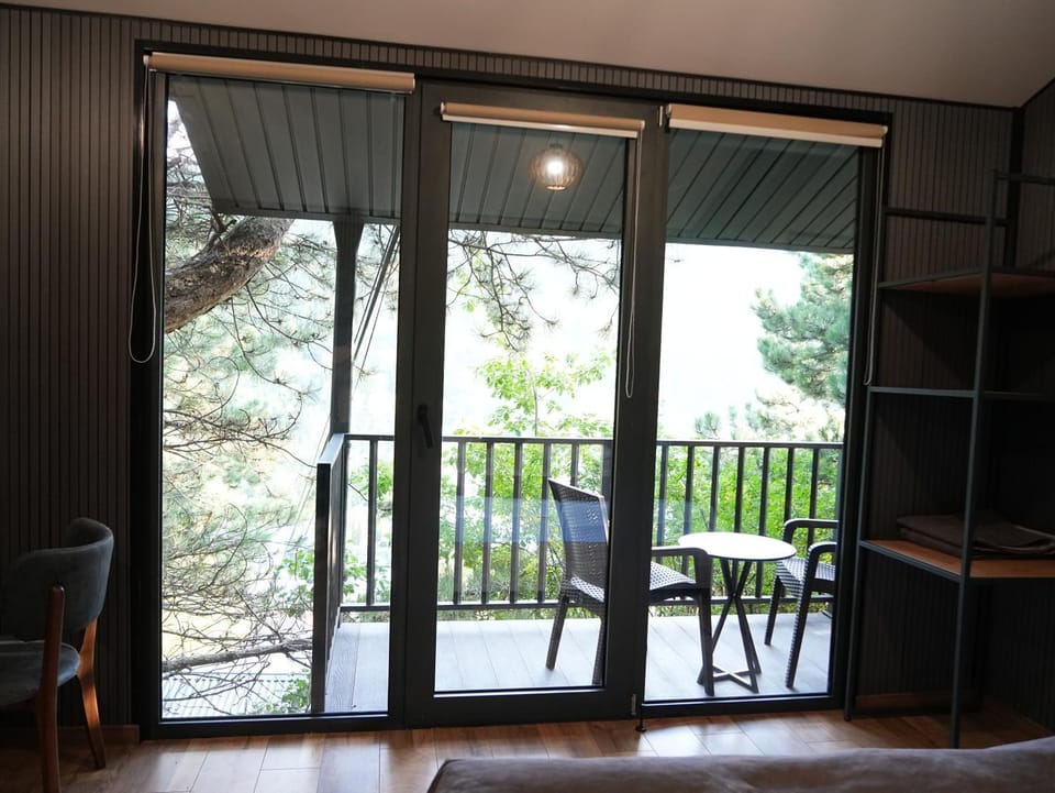 View (from property/room), Balcony/Terrace, Seating area, Garden view