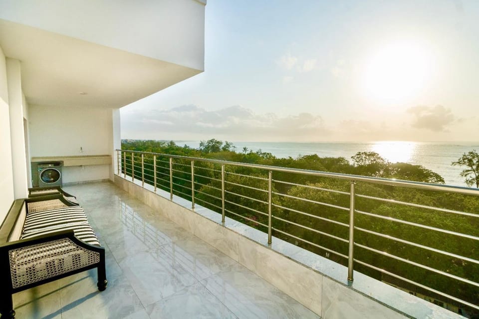 Property building, Patio, Day, Natural landscape, View (from property/room), Balcony/Terrace, Balcony/Terrace, Living room, Seating area, Sea view, Sea view, Sunrise, Sunset