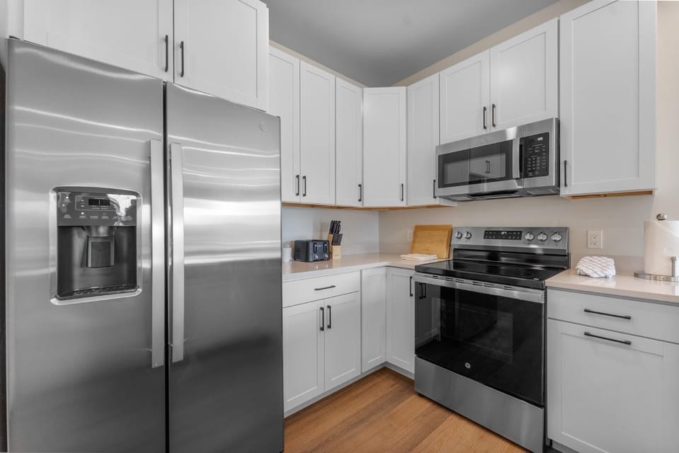 Kitchen or kitchenette, furniture, microwave, oven, stove