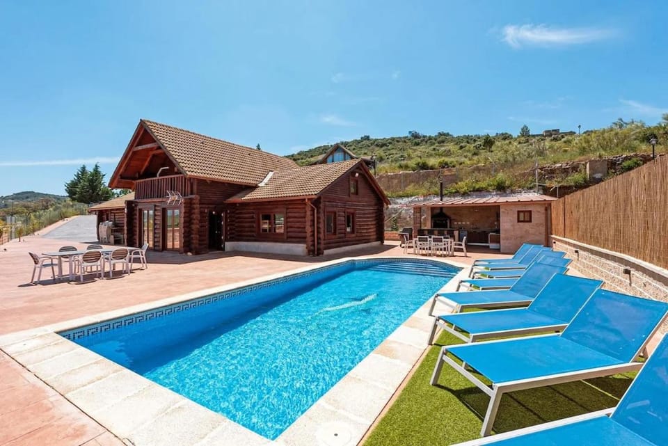 Property building, Patio, Natural landscape, Mountain view, Pool view, Swimming pool, sunbed
