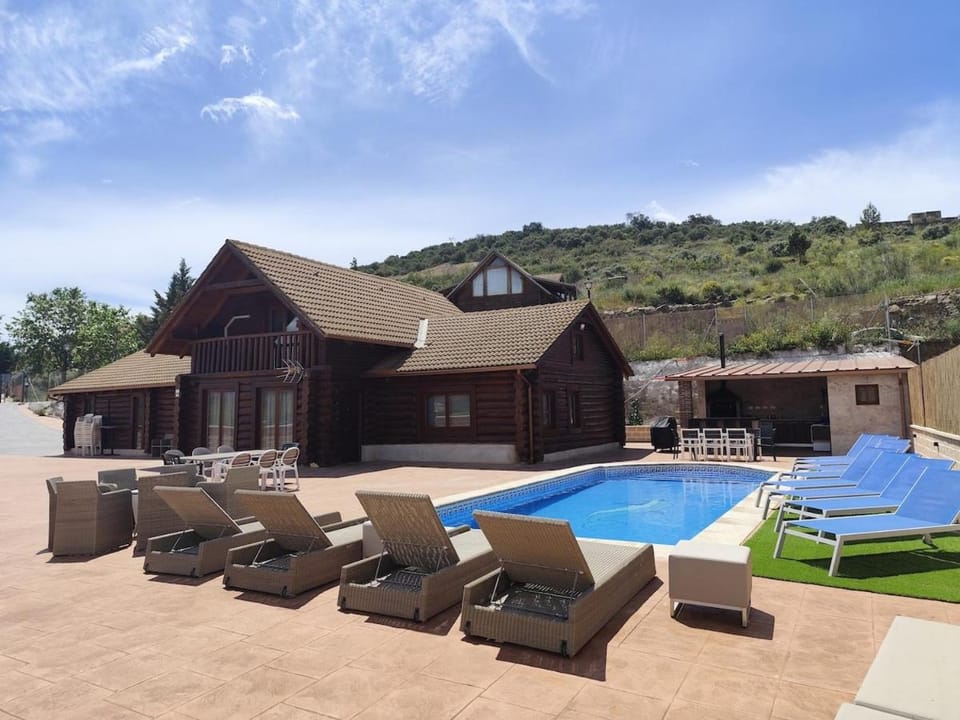 Property building, Patio, Natural landscape, Mountain view, Pool view, Swimming pool, sunbed