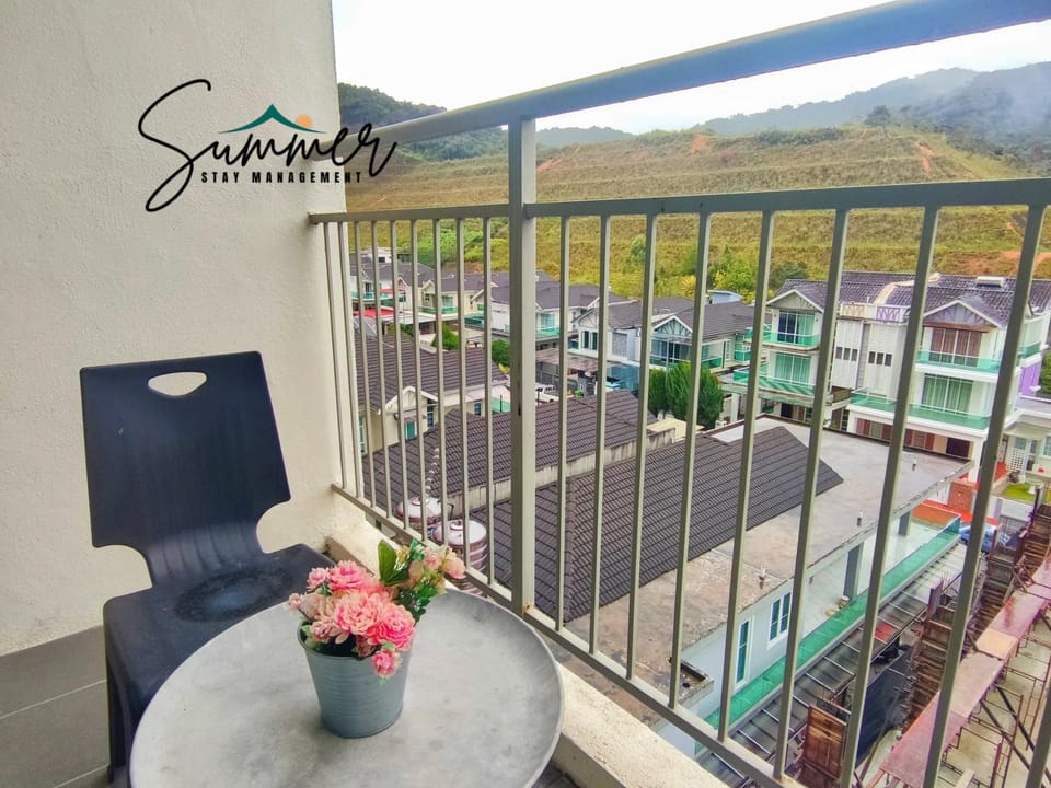 Property building, Patio, Day, Natural landscape, View (from property/room), Balcony/Terrace, Text overlay, Mountain view