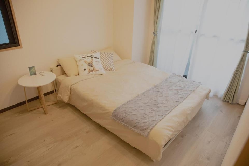 SN3A 大須徒歩10分 TV,パソコンなど設備充実 木の温もりあるナチュラルな部屋 8人可 10-minute walk to Osu Fully equipped with TV, PC, etc Natural wooden warm rooms Accommodates 8 people Apartment in Nagoya